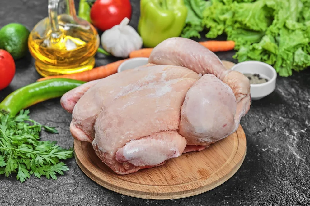 raw-whole-chicken-with-lettuce-p